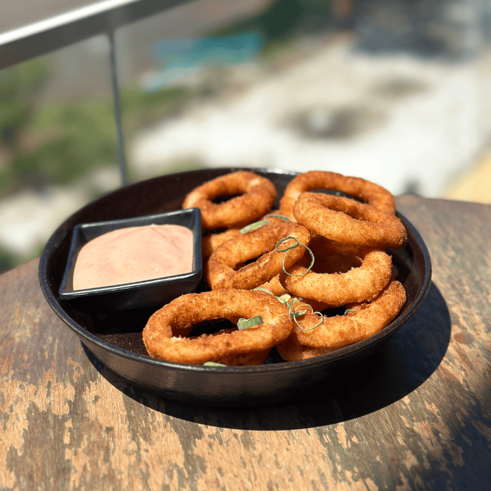 Anéis de Cebola Empanada 